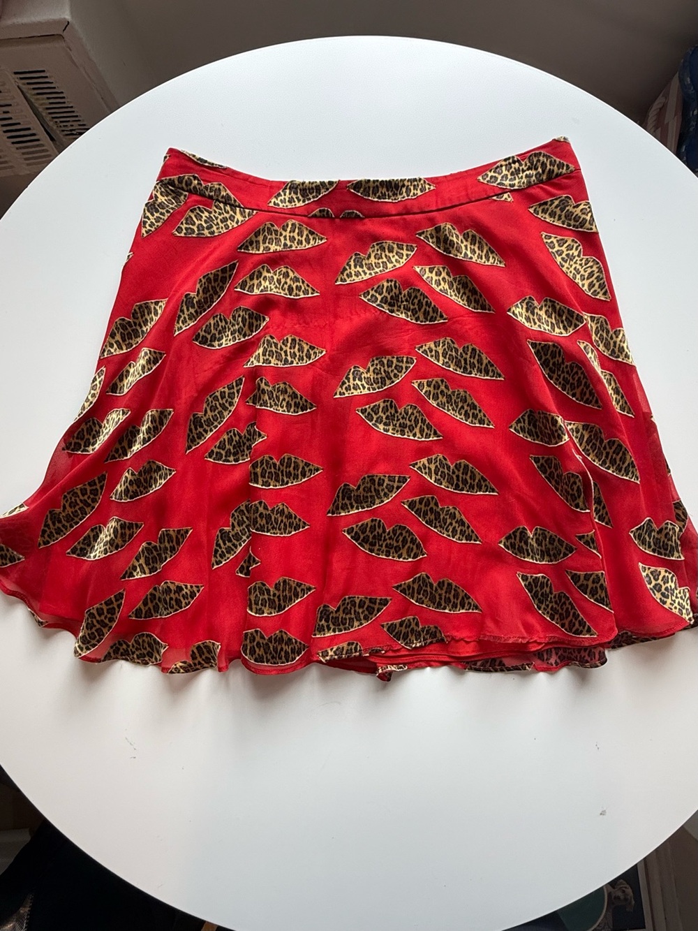 Alice + Olivia Red Skater Skirt with Leopard-Print Lip Motifs